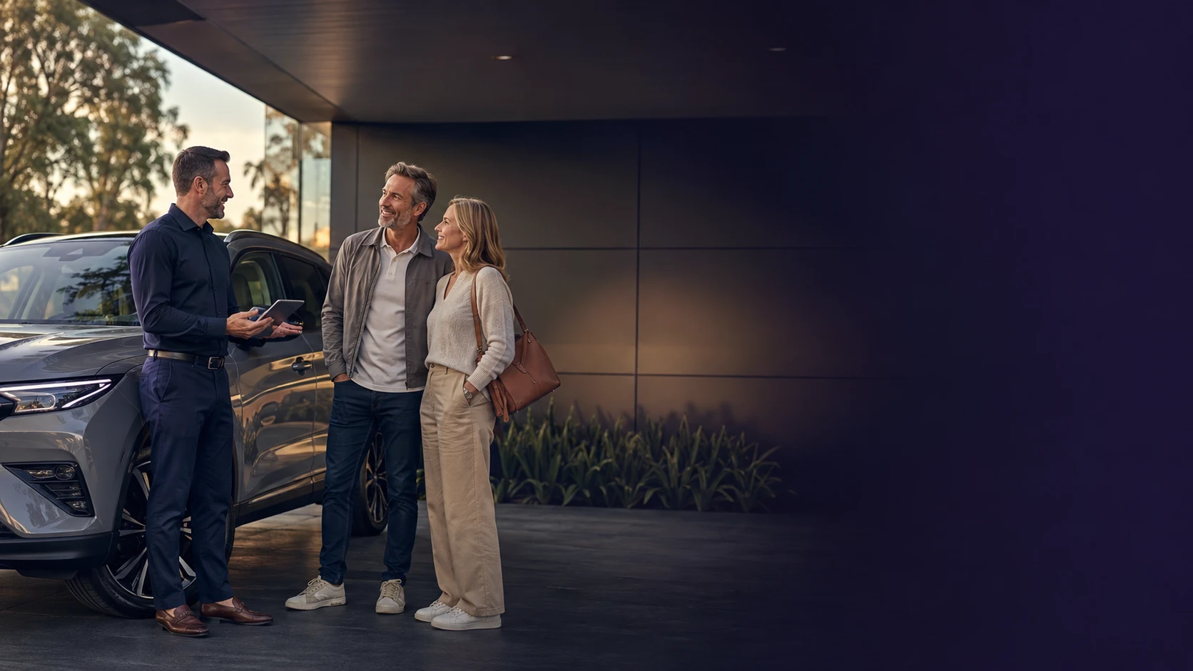 A customer collecting the keys to their new car from an Indigo team member